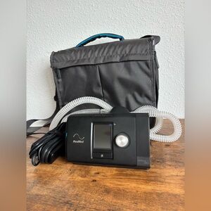 ResMed Black CPAP Device with Gray Carry Bag
